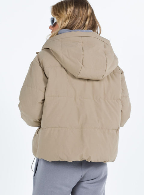 Beige puffer jacket Hood with drawstring Zip front fastening Twin front pockets Elasticated cuffs Drawstring waist