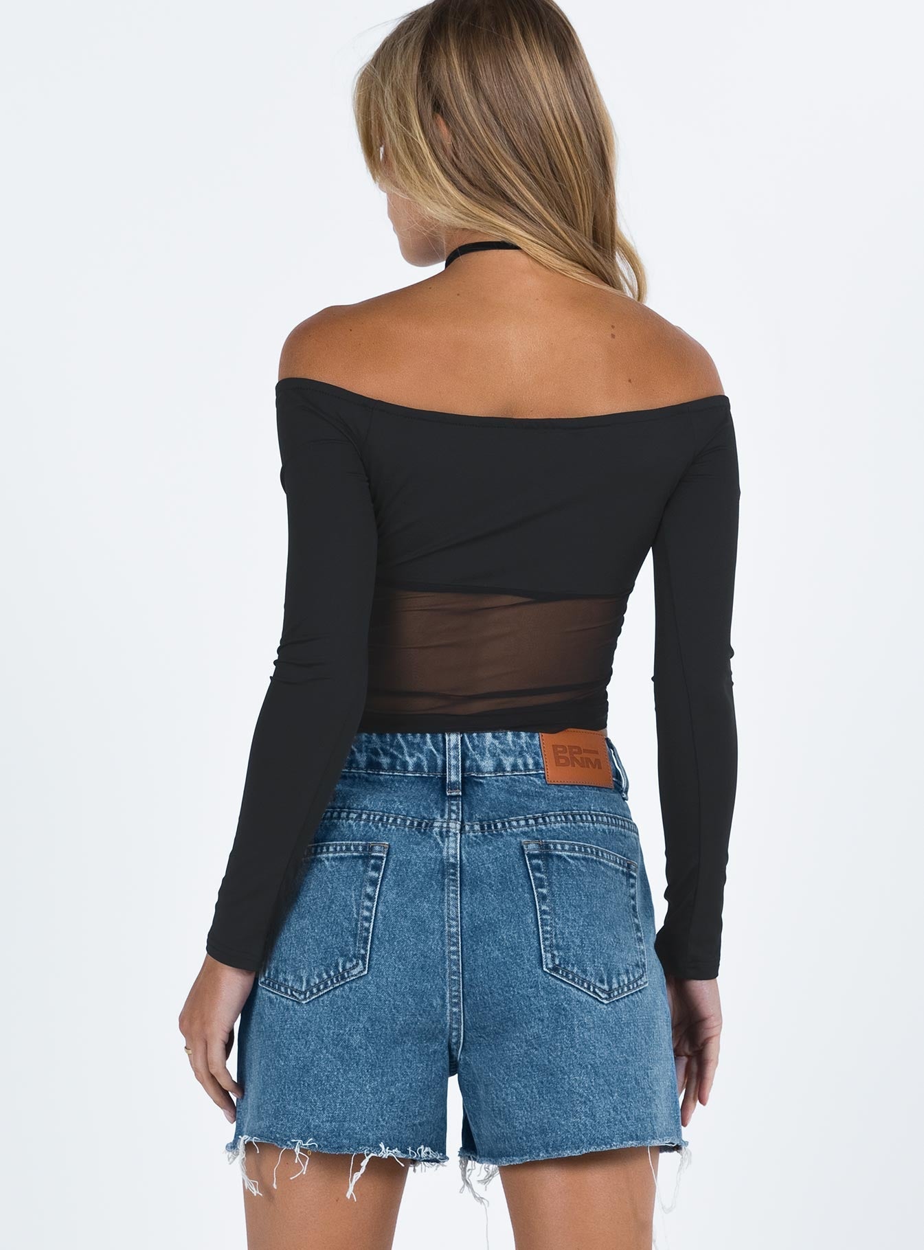 Denim shorts Zip and button fastening Belt loops at waist Raw cut hem Classic five pocket design Princess Polly patch on back