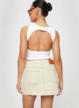 Cream denim mini skirt Belt looped waist, zip fastening at side, four-pocket design