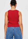 Tank top Knitted material, double tie closure, split hemline Non-stretch material, unlined, sheer