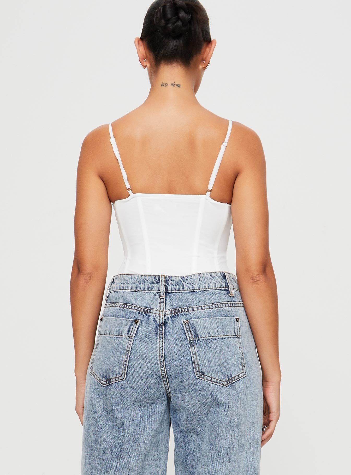 Mesh bodysuit Boning throughout, adjustable shoulder straps, sweetheart neckline, lace detail, wired cups, g-string style bottom, press clip fastening