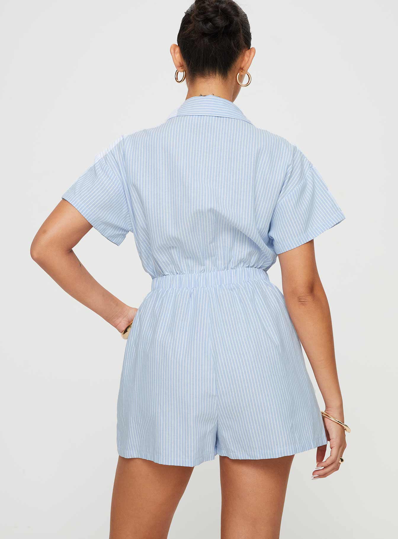 Striped romper Classic collar, button fastening down front, elasticated waistband