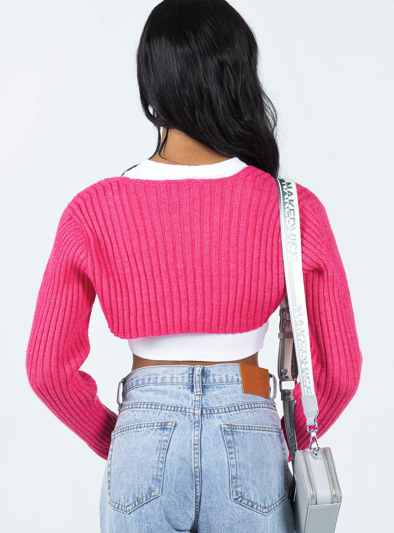 Bolero Knit material  Cropped back  Long sleeves 