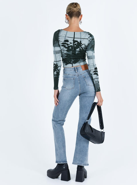 Jeans Mid wash denim Flared fit Front button & zip fastening  Belt looped waist Classic five pocket design Split hem Some stretch Unlined 