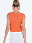 Orange top Sheer knit material Scoop neck Double tie fastening at front Good Stretch Unlined 