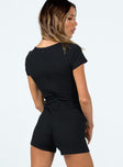Black slim fitting playsuit Ribbed material Cut out at bust Invisible zip fastening at back