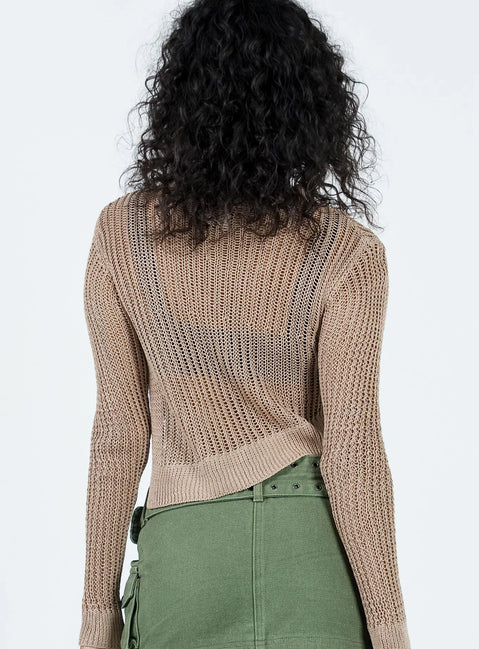 Sweater Knit material Sheer design Split hem at side