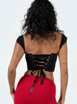 Corset top Sweetheart neckline Padded bust Cap sleeve Lace up fastening at back Boning through front