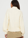 Turtle neck cable sweater Drop shoulder, ribbed cuff and waistband Good stretch, unlined 