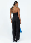 Strapless jumpsuit Pinstripe print Folded neckline Invisible zip fastening at back Boning through bust Elasticated back band Cut out sides Wide leg
