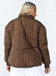 Puffer jacket  100% polyester  High neck  Zip front fastening  Twin zip pockets  Ribbed cuffs  Fully lined 