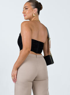 Bustier Lace material Inner silicone strip at bust Boning throughout Zip fastening at back