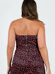 Strapless top Lining: 100% polyester Floral print Inner silicone strip at bust Folded neckline Zip fastening at back