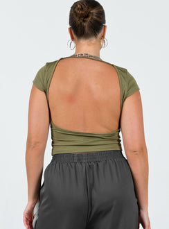 Crop top Ribbed material Large cut out at back Cap sleeve Good stretch