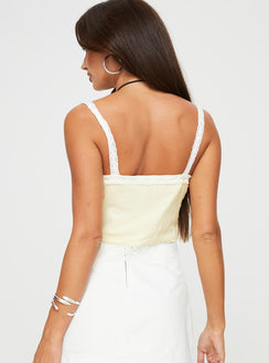 Lace top Double tie front fastening, pleated bust Fully lined, non stretch 