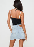 Denim mini skirt High rise fit, belt looped waist, zip and button fastening, raw edge hem Non stretch material, unlined