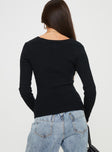 Sweater  Knit-like material, cross over design, V-neckline, long sleeves Good stretch, unlined 