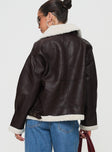 Faux leather jacket Classic collar, exposed zip fastening, twin pockets, buckle detail