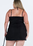 Black mini dress Adjustable shoulder straps  Ruched sides  Invisible zip fastening  Side slit  Good stretch Fully lined 
