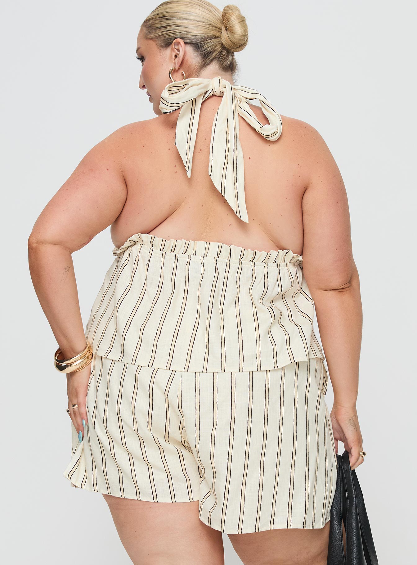 Princess Polly Curve  Striped linen set Halter neck top, tie fastening, elasticated band under bust, v-neckline High-rise shorts, elasticated waistband, twin hip pocket Non-stretch material, partially lined  Princess Polly Lower Impact