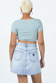 Mini skirt Mid-wash denim A-line design High waisted  Classic five pocket design Zip & button fastening Belt looped waist Raw edge hem Distressed detail