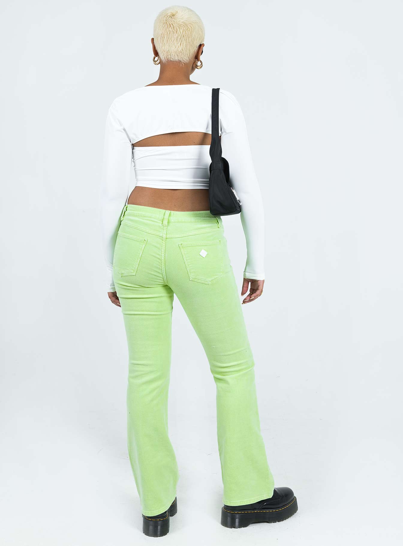 Pant Corduroy material Low-rise Belt looped waist Classic five-pocket design Flared leg