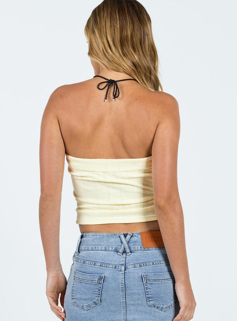 Tube top Soft knit material Folded neckline Inner silicone trip at bust Adjustable drawstring front Tie fastening at front Good Stretch Unlined 