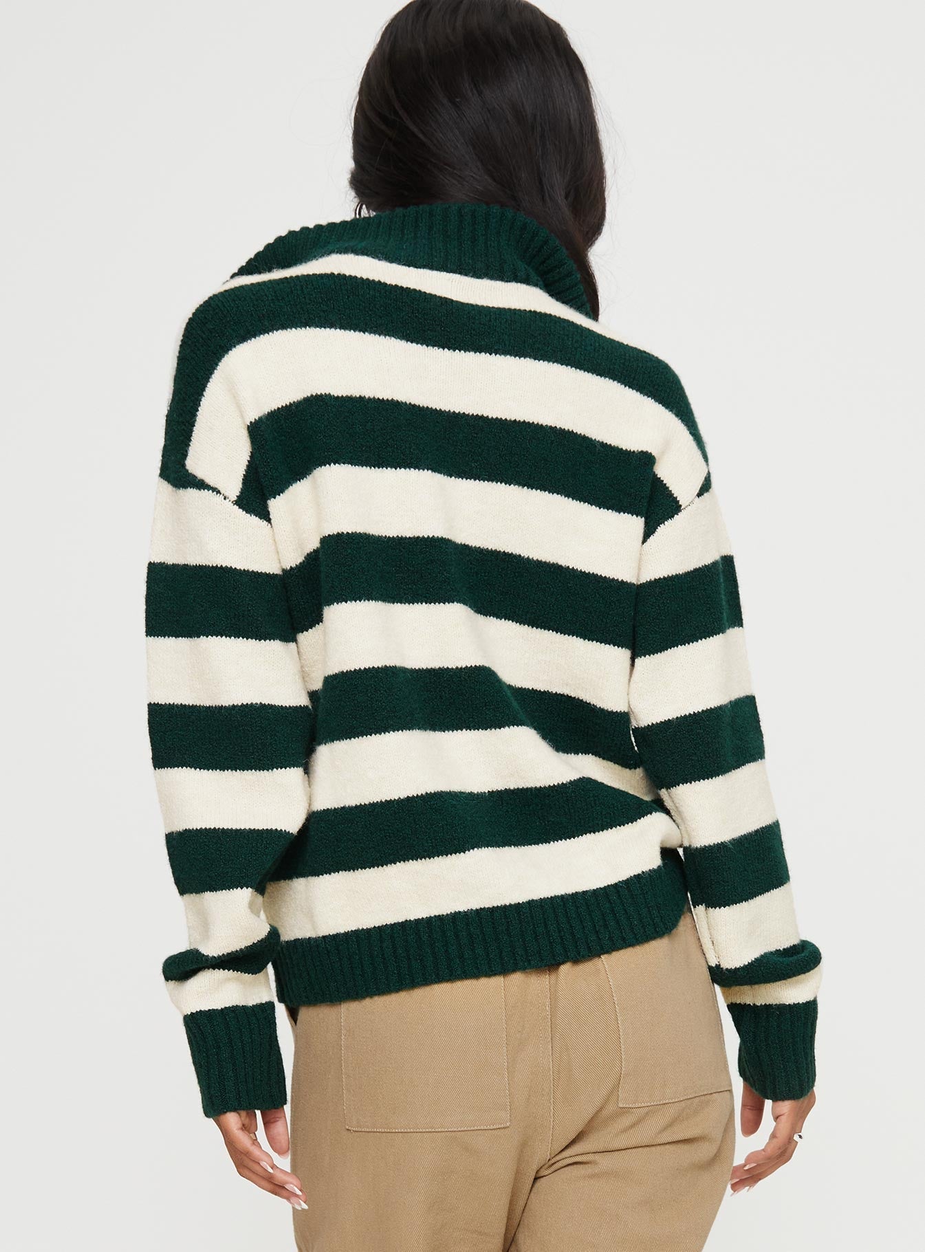 Knit striped sweater Quarter zip fastening at front, high neckline, drop shoulder Good stretch, unlined 