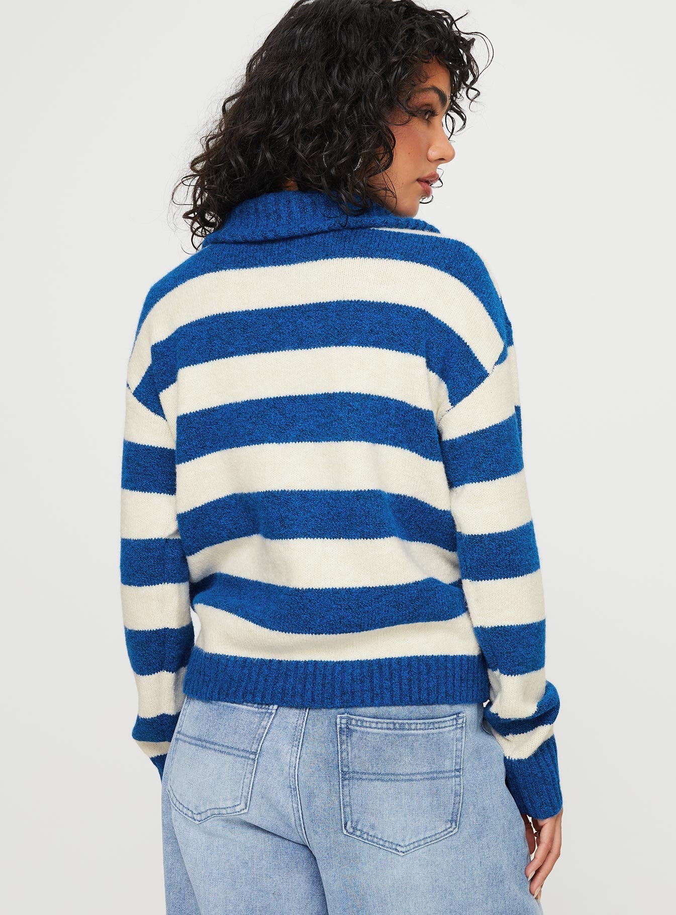 Knit striped sweater Quarter zip fastening at front, high neckline, drop shoulder Good stretch, unlined 