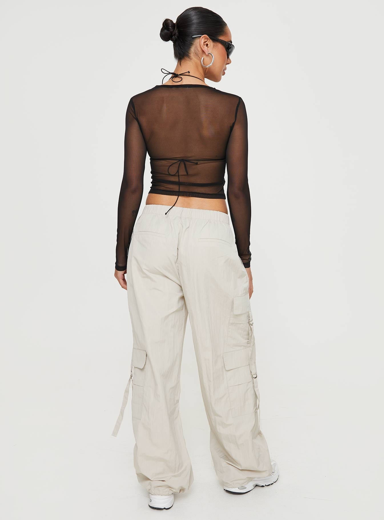 Cargo pants High-waisted, twin cargo style pockets on leg, faux pockets at the back, elasticated waist & hem cuff Non-stretch, unlined 