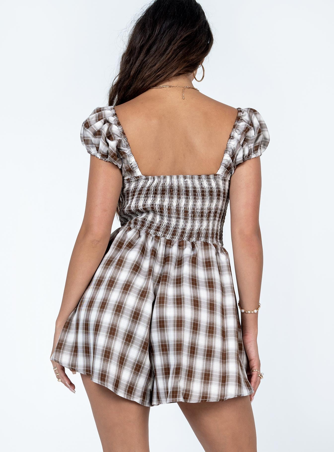 Romper Plaid print  Elasticated shoulder straps  Puff sleeves  Adjustable tie at bust 