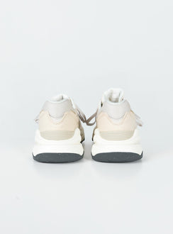 Sneakers  Faux suede & leather material  Lace-up style  Platform base Padded inner  Treaded sole 