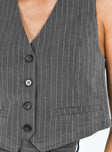 Vest top Pinstripe print V neckline Button fastening at front Faux pockets Pointed hem