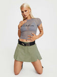 Green Mini skort Belt looped waist zip and button front fastening pleated hem built in shorts