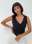 Black top Lace trimming  V neckline  Hook and eye front fastening  Non stretch Fully lined 