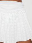 Mini skirt High waist fit, flowy style, invisible zip fastening at side Non-stretch material, fully lined 