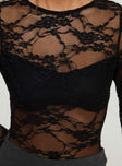 Lace material, high neckline, flared sleeve, high cut leg, g string bottom, press clip fastening at base