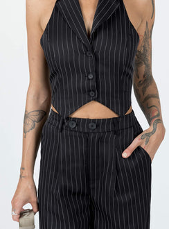 Matching set Pinstripe print  Vest top  Lapel collar  Button front fastening  High waisted pants  Zip & button fastening  Belt looped waist  Twin hip pockets  Elasticated back Wide leg 