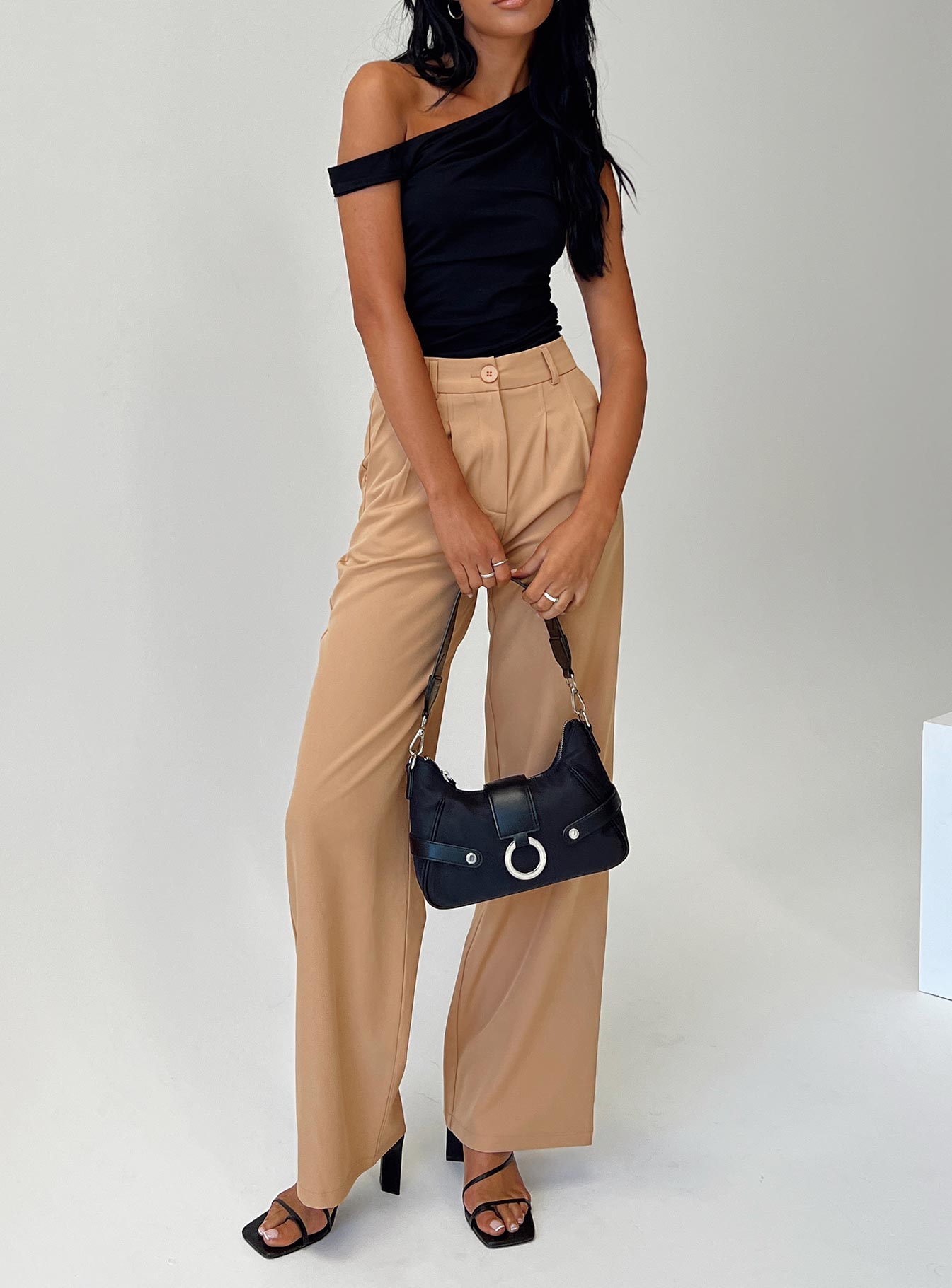 Pants Front button and zip fastening Belt looped waist Subtle pleats at waist Twin hip pockets
