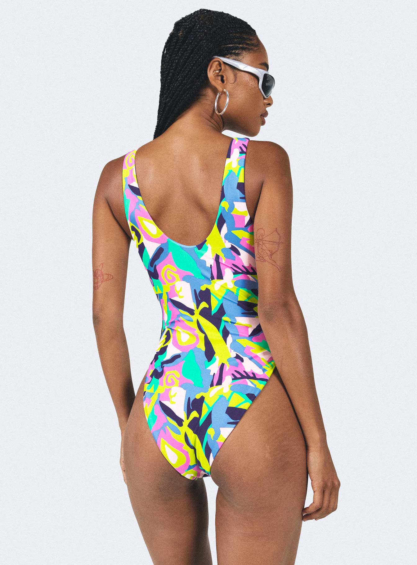 One piece Graphic print V-neckline Fixed straps High cut leg