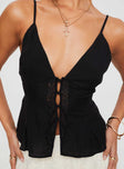 Crop top V-neckline, adjustable shoulder straps, lace detail at front, tie fastening at back, button fastening down front