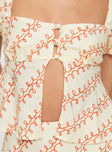 Graphic crop top Puff sleeve, square neckline, button fastening down front, split hem