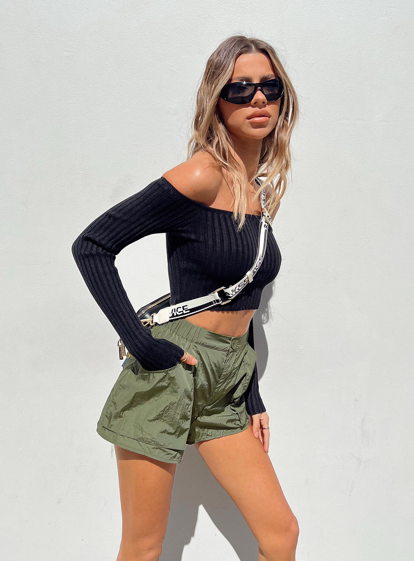 Cargo shorts Windbreaker material Elasticated waistband Zip & button fastening Twin hip pockets