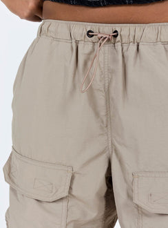 Cargo pants High rise Elasticated waistband with drawstring Six pocket design Straight leg