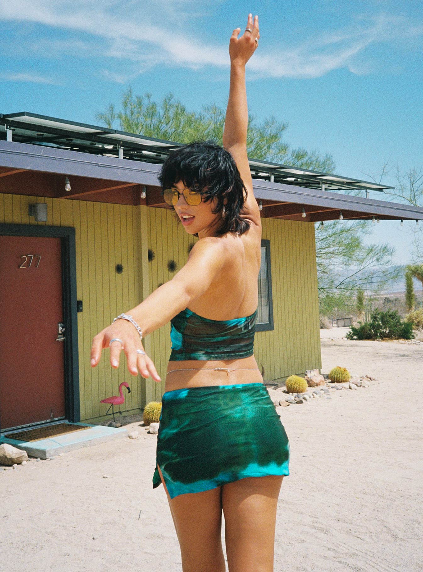 Matching set Sheer mesh material Printed design Strapless top Adjustable tie ruching at bust Low rise mini skirt Elasticated waistband Side slit