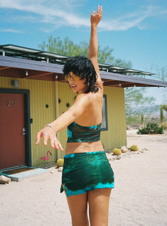 Matching set Sheer mesh material Printed design Strapless top Adjustable tie ruching at bust Low rise mini skirt Elasticated waistband Side slit