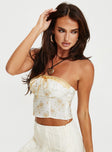 Strapless floral crop top Invisible zip fastening at side, lace trim, ribbon detail Non-stretch material, unlined 