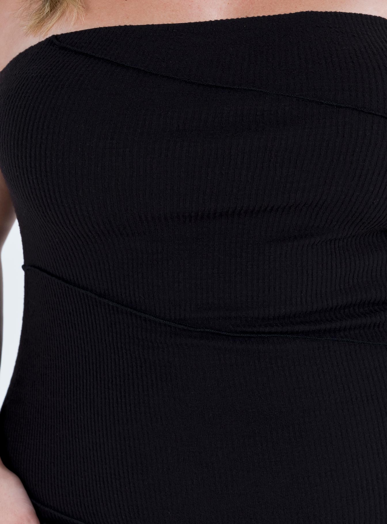 Black mini dress Ribbed knit material  Strapless design Inner silicone strip at bust  Invisible zip fastening at side Diagonal stitching 