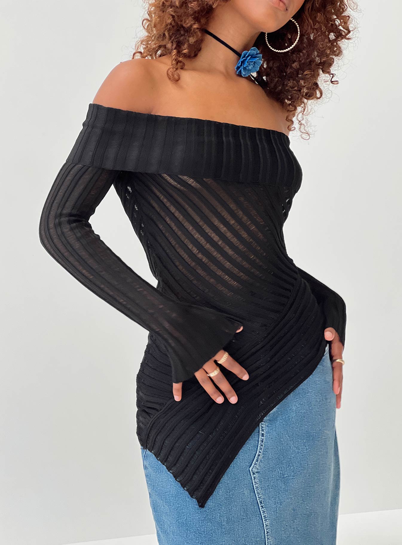 Off the shoulder sweater Sheer knit material, folded neckline, asymmetrical hemline Good stretch, unlined, sheer