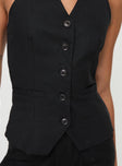 Black Matching set Vest halter style, open back, button fastening, faux twin hip pockets, elasticated waistband with belt loops, button and zip fastening